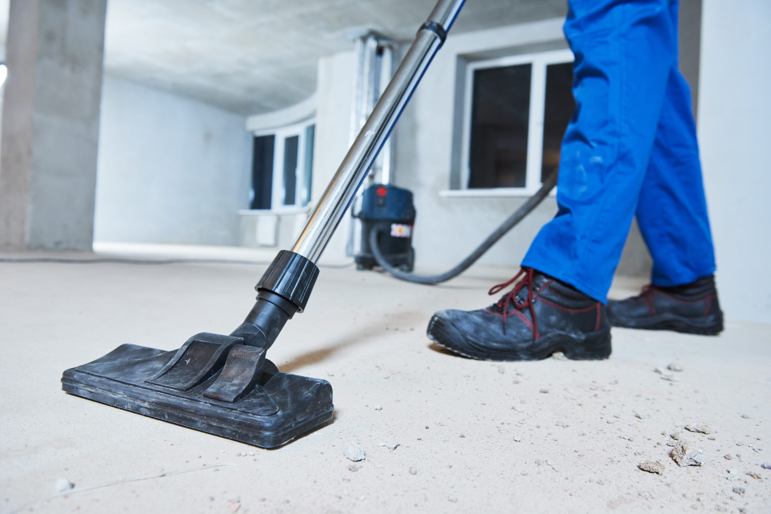 cleaning service. dust removal with vacuum cleaner construction cleaning services
